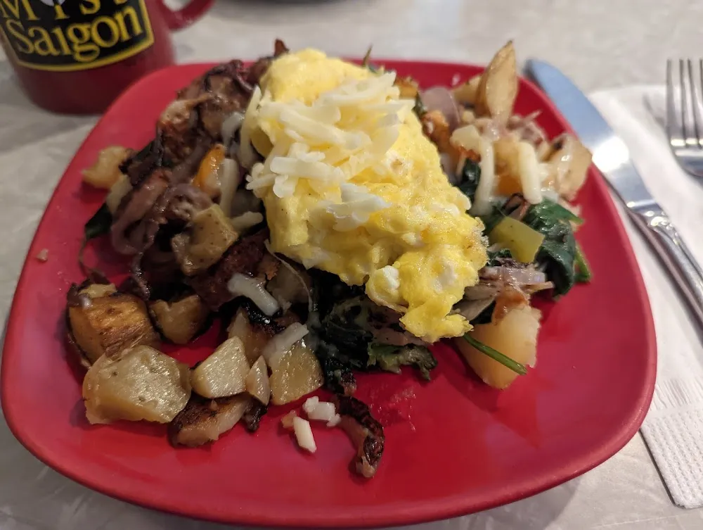 Manor Fries w Side of Scrambled Eggs and Hot Sauce